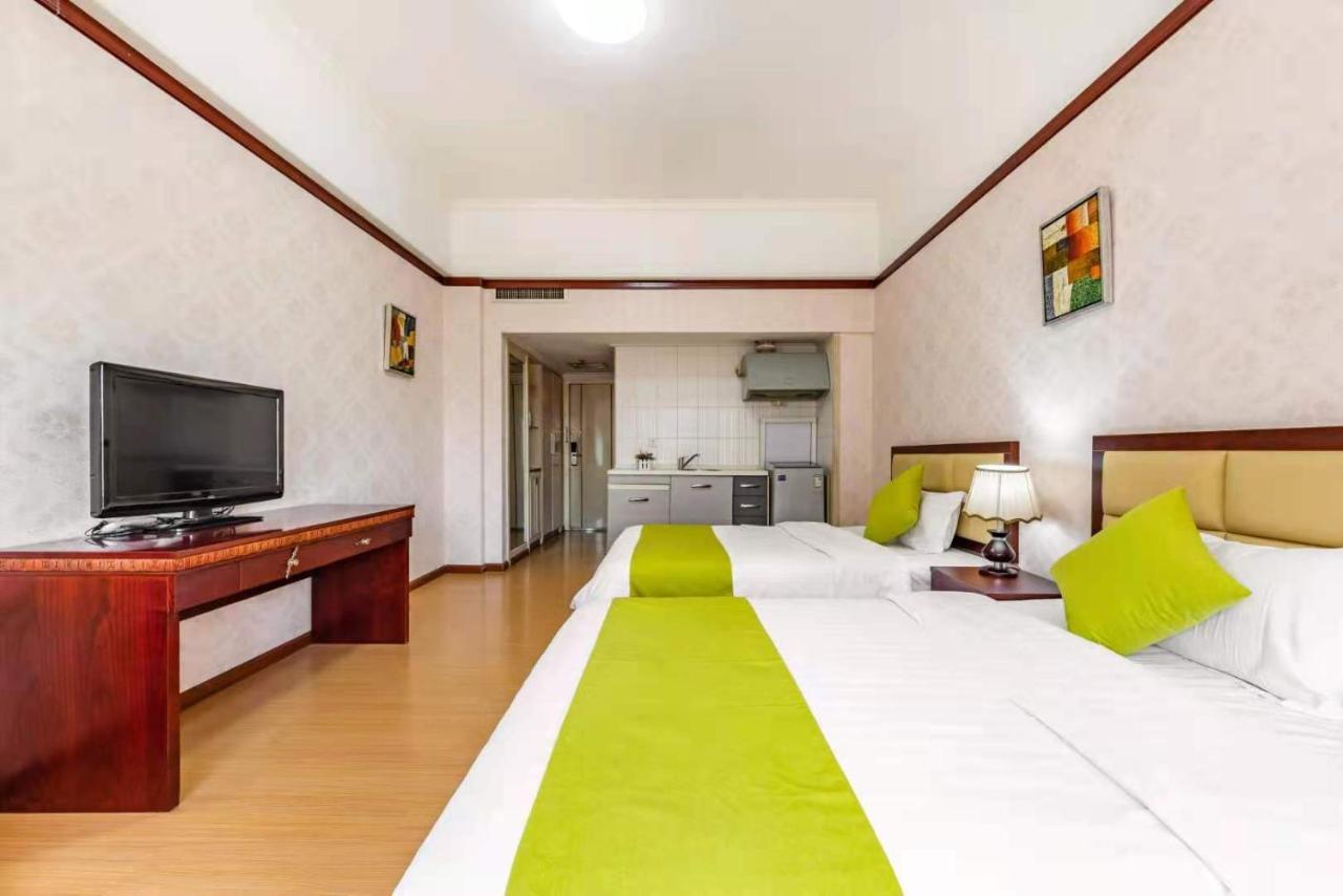 Ha Luo Hotel Kunming Bagian luar foto