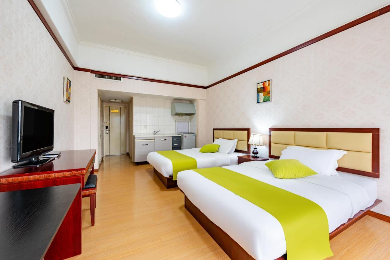 Ha Luo Hotel Kunming Bagian luar foto