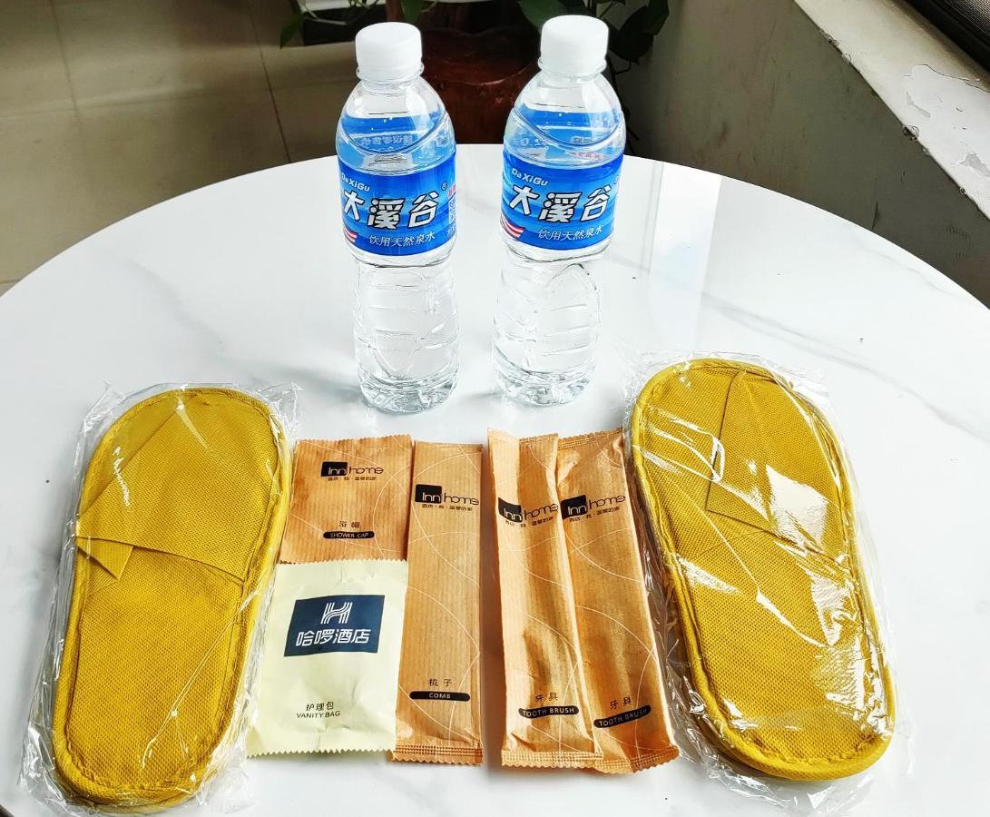 Ha Luo Hotel Kunming Bagian luar foto