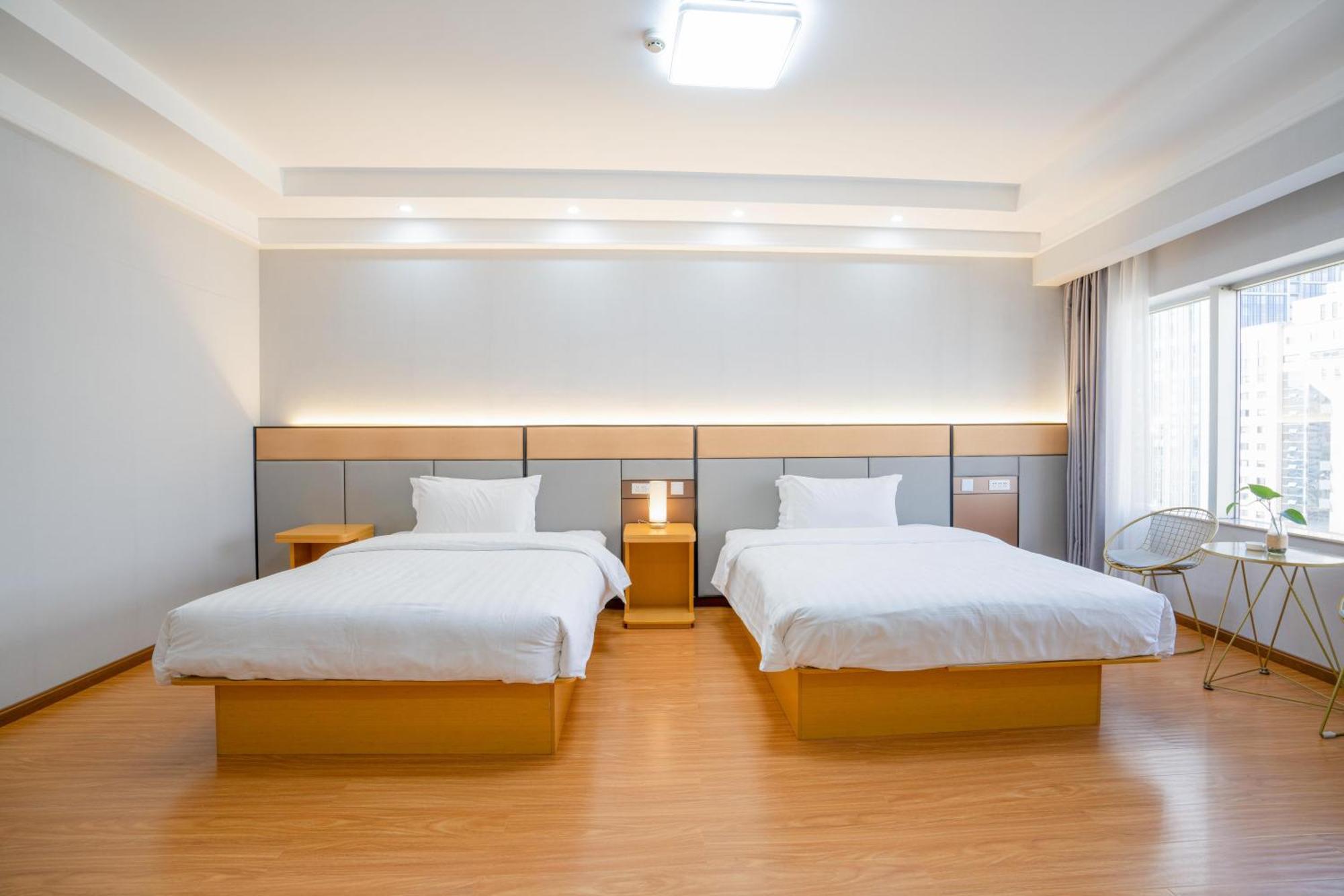 Ha Luo Hotel Kunming Bagian luar foto
