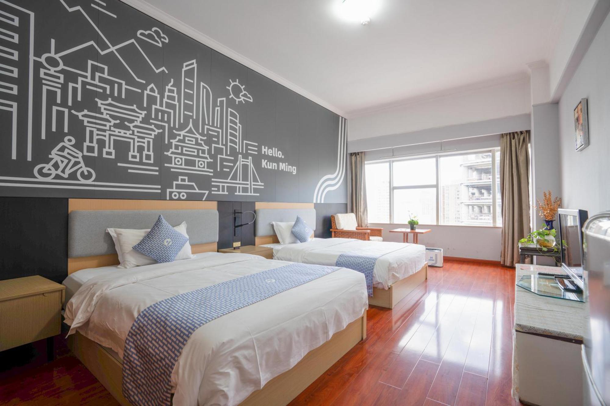 Ha Luo Hotel Kunming Bagian luar foto